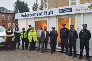 The leader of the Council, along with police and enforcement officers outside the Enforcement Hub in York Road
